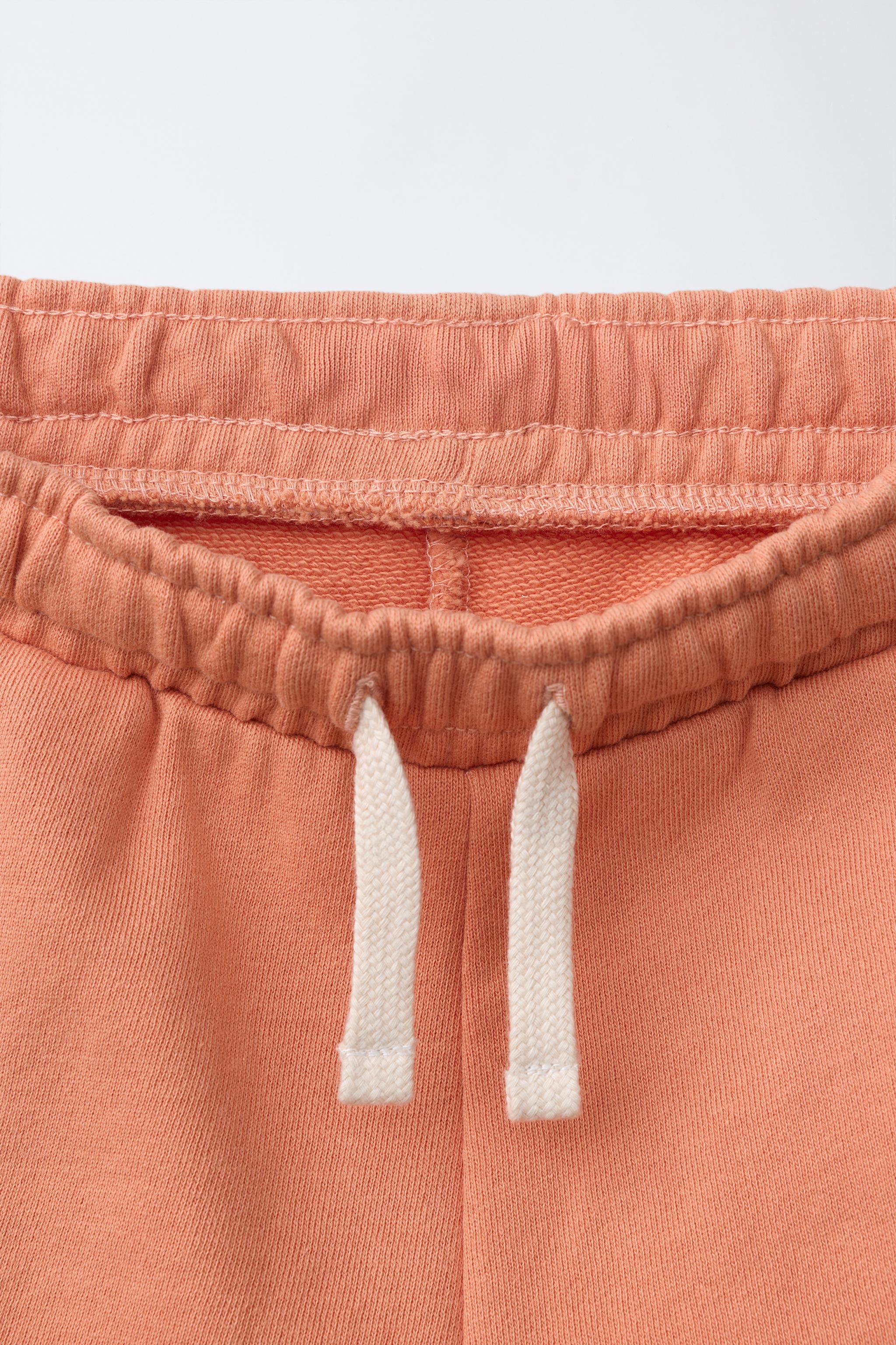 GARMENT DYED LOGO PLUSH SHORTS